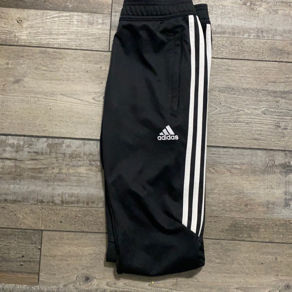 Black Adidas track pants